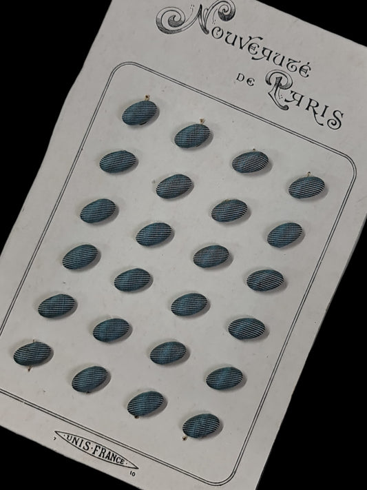 Botones años 20 con formas de ovalada ralladas azules, 100% algodón.